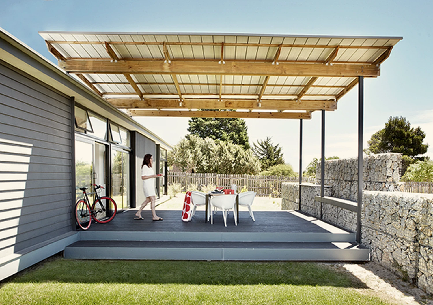 Covered deck with seating and bicycles