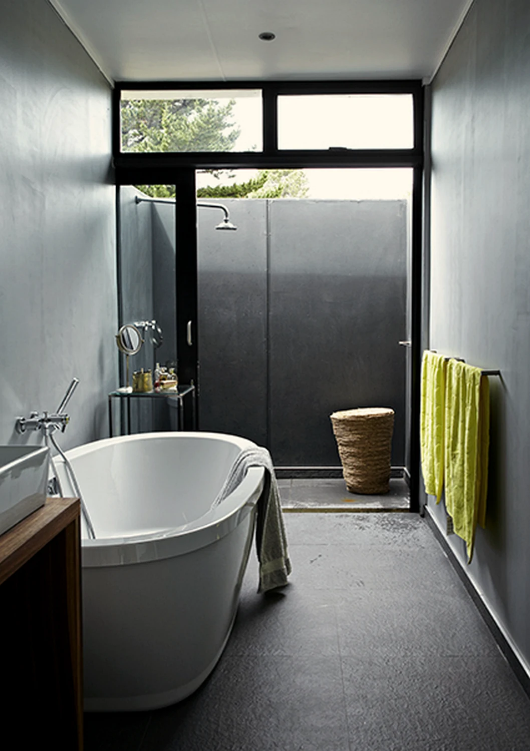 Bathroom with freestanding tub and slate floor